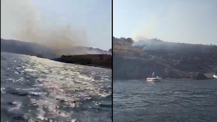 Tekneden atılan işaret fişeği adayı yaktı