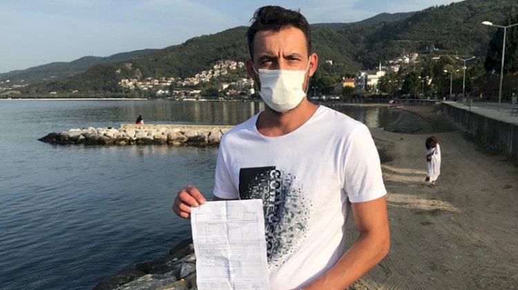 Yüzerken maske takmadığı için ceza yedi