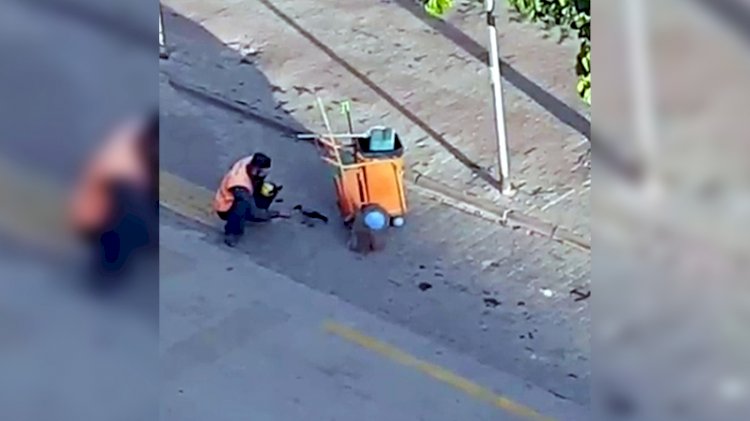 Temizlik işçisi, kargayı elleriyle besledi