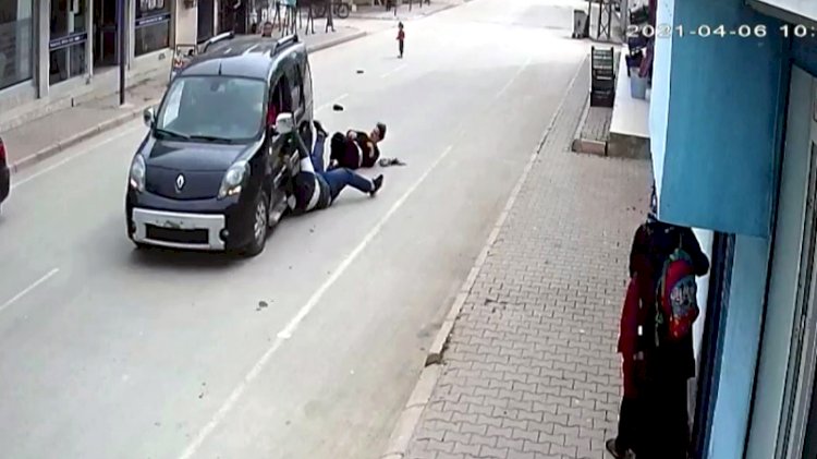 Telefonunu gasbettiği genç kız ile kardeşini aracıyla metrelerce sürükledi