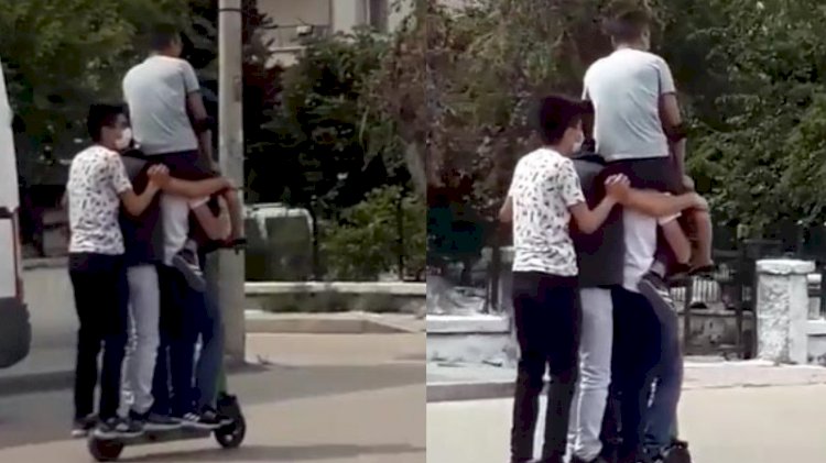 Elektrikli scooter üzerinde tehlikeli yolculuk