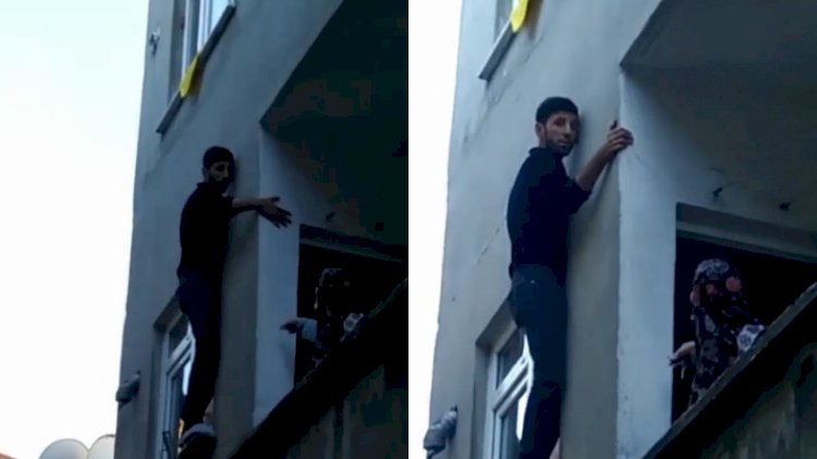 Pencerede mahsur kalan hırsız, bina sakinlerine yalvardı